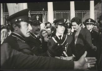 Police manage the crowds attending the funeral of Settimio Passamonti, 23rd April 1977, Rome