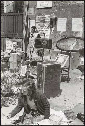 A street market selling household items 
