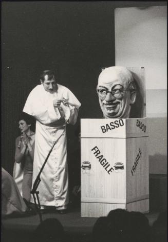 Pippo Franco performs a sketch dressed as a pope, with an effigy of the politician Lelio Basso 