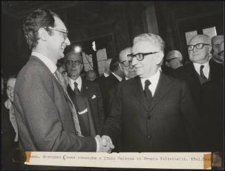 President of the Republic Giovanni Leone shakes Italo Calvino's hand as he presents him with the prestigious Feltrinello prize
