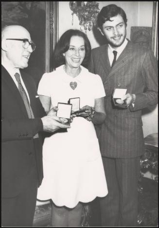 Paulette Goddard, Cesare Zavattini and Andrea Giordana at an award ceremony