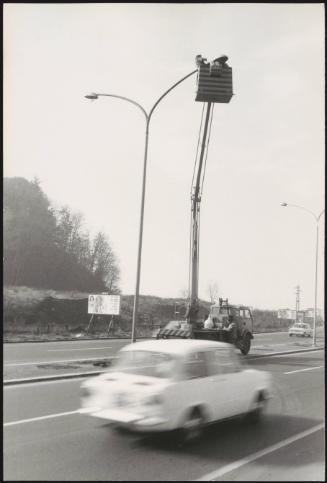 A crane over a road. 