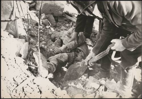 A victim of the Belice earthquake is dug from the rubble by police, 1968, Sicily