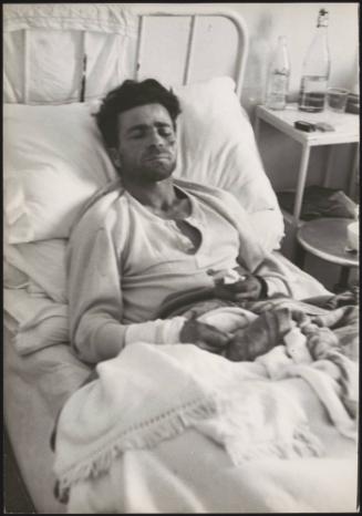 A man recovers in hospital after being injured in the Belice earthquake, Sicily 1968