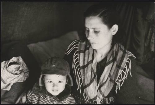 A mother and her child in their temporary shelter in the aftermath of the Belice earthquake, Sicily 1968