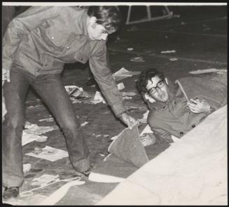 Two young men attend protests in the destroyed town Gibellina after the earthquake Belice in Sicily 1968