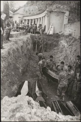 A mass grave is dug in the Cemetery in Osoppo, to bury the victims of the Friuli earthquake 1976