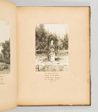 A rose covered shrine in the garden of Ste. Anne's Academy, in Victoria, B.C. Canada. [Page 27 of Quebec I; from collection of Canadian albums compiled by Edith S. Watson, 1890s-1930s]