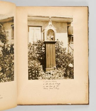 A garden shrine in Ste. Anne de Beaupré at the home of the Misses Moore + Riggs. [Page 17 of Quebec I; from collection of Canadian albums compiled by Edith S. Watson, 1890s-1930s]