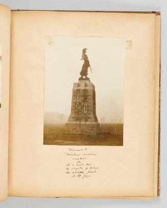 Monument to Madeleine Vercheres. Vercheres, Que. It is said that the daughter of Hebert, the sculptor, posed for the figure. Page 29 of Quebec II; from collection of Canadian albums compiled by Edith S. Watson, 1890s-1930s
