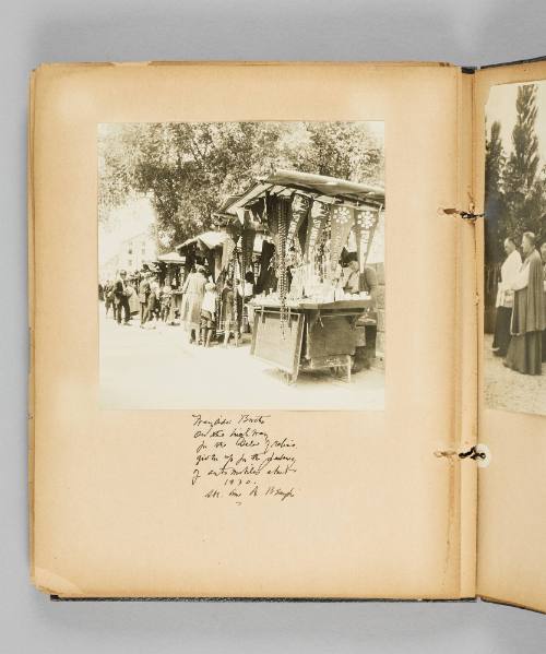 Wayside booths on the highway for the sale of relics, given up for the [illeg. Jalomy? as misspelling of and misuse of or archaic use of Jalopy?] of automobiles about 1930. Ste. Anne de Beaupré. Page 52 of Ste Anne de Beaupré; from collection of Canadian albums compiled by Edith S. Watson, 1890s-1930s