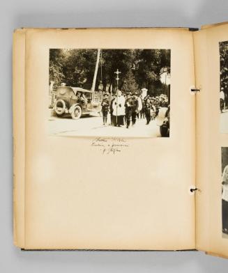 Brother [illeg.] leading a procession of pilgrims. Page 40 of Ste Anne de Beaupré; from collection of Canadian albums compiled by Edith S. Watson, 1890s-1930s