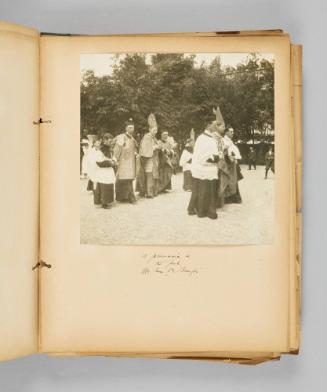 A procession in the park, Ste. Anne de Beaupré. Page 25 of Ste Anne de Beaupré; from collection of Canadian albums compiled by Edith S. Watson, 1890s-1930s