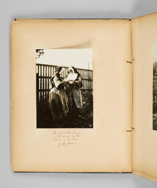 The first strawberries in the convent garden. Sisters of the Order of Ste. Rosaire. Page 18 of Ste Anne de Beaupré; from collection of Canadian albums compiled by Edith S. Watson, 1890s-1930s