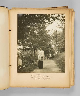 At the stations of the cross. Page 9 of Ste Anne de Beaupré; from collection of Canadian albums compiled by Edith S. Watson, 1890s-1930s