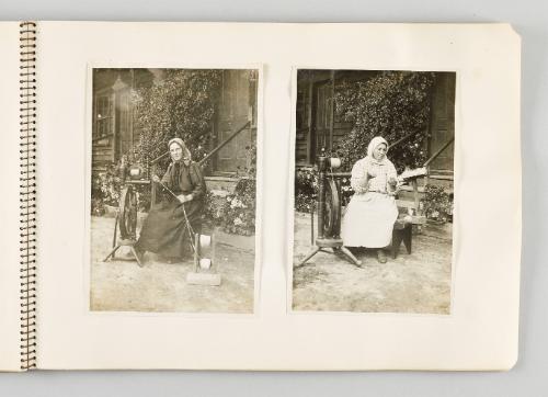 [Women posing outside of their homes with their spinning wheels] [Page 41 of The Doukhobors I album]