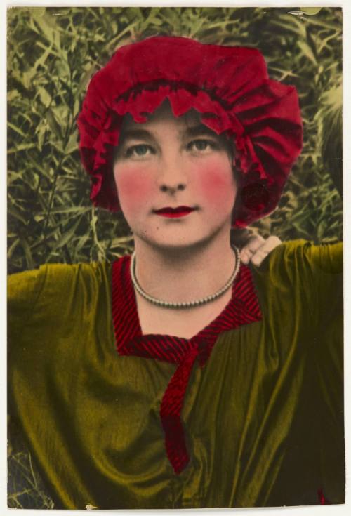 Portait of a woman in red bathing bonet