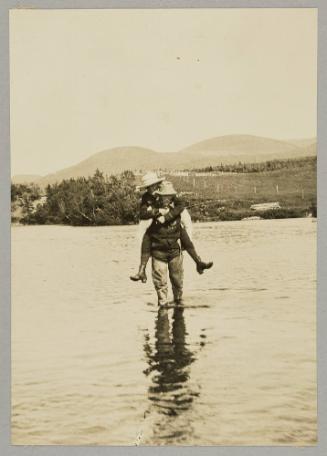 Fording the river at Little River, Nfld.