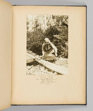 Panning gold near Indian Reservation [sic] at Old Nassau, Queen Charlotte Is. [Haida Gwaii] Canada [Page 31 of Happy Voyages with Queenie album]