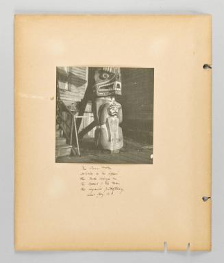 The Bear totem carries in "The copper", the rude design on the breast of the man, the symbol of Christianity, Alert Bay, B.C. [Page 6 of Alert Bay, Queen Charlotte Islands, and Victoria, B.C. album]