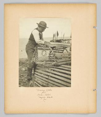 Mending lobster pots, Havre Aubert. Magdalen Islands, Que. [Page 16 of Children album]

