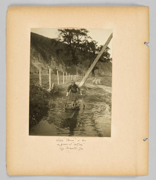 Little "Marie" in her improvised "bateau" Cap Tormonte, Que. [Page 10 of Children album]
