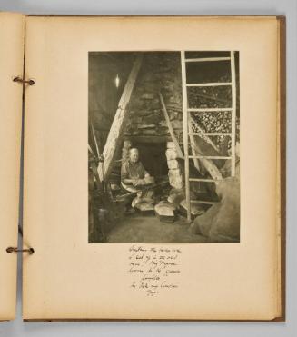 Sometimes the bake oven is set up in the old barn! Big French loaves for the "grande famille". In Isle aux Coudres, Que. [Page 45 of Wells and Pots album]
