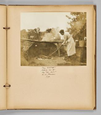 Habitant family has its big oven pot, in Que. [Page 33 of Wells and Pots album]
