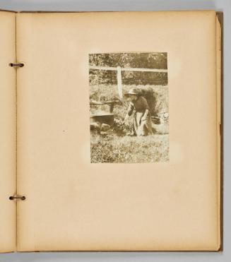 [Woman cooking over big pot outdoors] [Page 27 of Wells and Pots album] 
