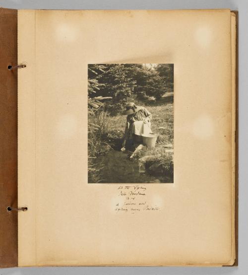 At the Spring Isle Madame N.S. A famous old spring near Pondville [Page 1 of Wells and Pots album]
