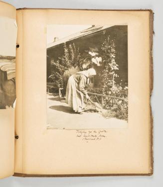 Tidying up her garden with hand-made broom, Brilliant, B.C [Page 81 of The Doukhobors II album]