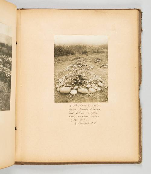 A Doukhobor graveyard. Apples, peaches, cherries, and plums are often seen, as above, a-top of the graves, In Brilliant, B.C [Page 73 of The Doukhobors II album]