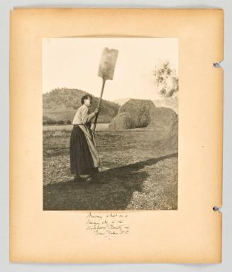 Winnowing wheat on a breezy day, in the Doukhobor Community at Grand Forks, B.C [Page 52 of The Doukhobors II album]