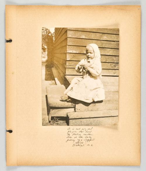 It is not only old fingers that hold the knitting needles. Look at this baby picking up a dropped stitch! Brilliant, B.C [Page 27 of The Doukhobors II album]