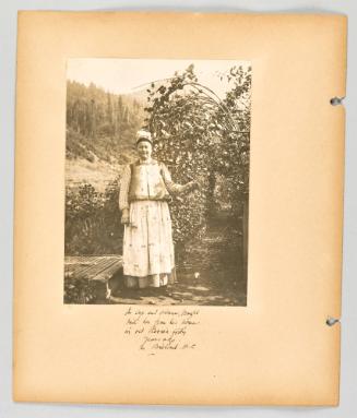 In cap and blouse brought with her from her house in old Russia forty years ago, in Brilliant, B.C [Page 22 of The Doukhobors II album]