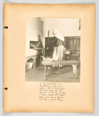 As the Doukhobors are vegetarians, they use a great deal of dried fruit. The fruit goes with the big oven in the hay you see -- when baked in a slow fire, goes out in the sun to dry in great trays. [Page 17 of The Doukhobors II album]