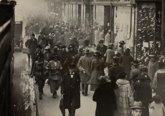 Happy Crowds in Oxford St. The Christmas Spirit.