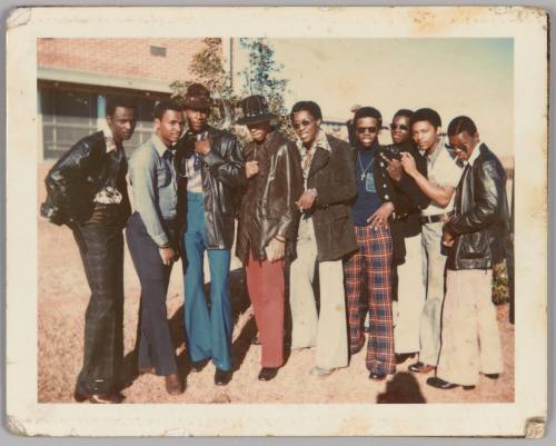 Georgia UT'S, 73 [Group of nine men pose outdoors, all wearing wide-leg pants]
