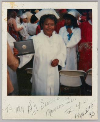 To My Big Brother Monroe Jr. From Your Marsha, '83 [Young woman in white graduation gown holding diploma]