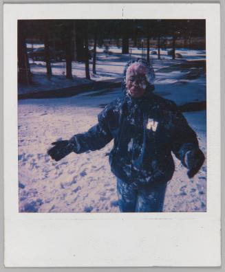 [Woman covered in snow outside in winter]
