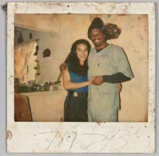 7/17/93 [Man and woman holding hands in home]
