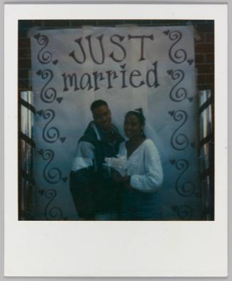 Ira Thomas / Nia Edwards, Pomona High [Bride and groom, Just Married sign]
