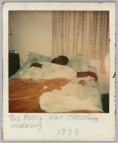 Big Billy out Christmas Morning, 1979 [Man asleep in bed]
