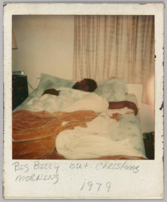 Big Billy out Christmas Morning, 1979 [Man asleep in bed]

