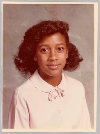 For: Dad and Linda From: Michelle with all my love. [Close-up portrait of a teenage girl in a pink buttoned shirt with a bow collar]