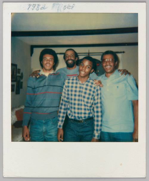 1982 Noel [Four men posing]
