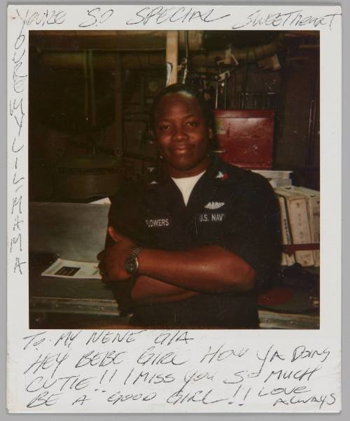 You're so special sweetheart, You're my lil Mama, To my Nene Gia, Hey bebe girl how ya doing cutie!! I miss you so much be a good girl!! Love always [Man in U.S. Navy uniform with the name "Flowers", he is smiling with his arms crossed ]