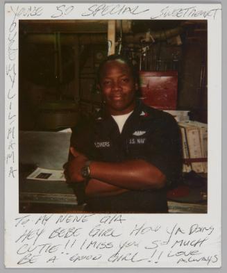 You're so special sweetheart, You're my lil Mama, To my Nene Gia, Hey bebe girl how ya doing cutie!! I miss you so much be a good girl!! Love always [Man in U.S. Navy uniform with the name "Flowers", he is smiling with his arms crossed ]