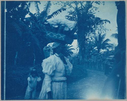 [child, woman carrying load on head]