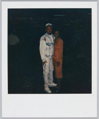 [Young couple, man on wears acid wash denim jacket and jeans]